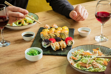 couple eating sashimi in the restaurant