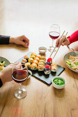 couple eating sashimi in the restaurant
