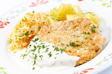 chicken with potatoes and salad
