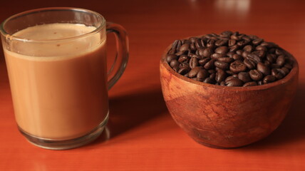 Indonesian coffee on wooden background. Coffee Beans in wooden container.