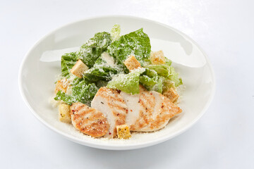 Caesar salad on the white background