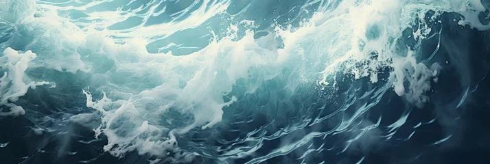 Deurstickers In a close-up view, dynamic ocean waves crash with intensity, creating a mesmerizing display of white foam as the relentless energy of the sea unfolds in vivid detail. © DIMENSIONS