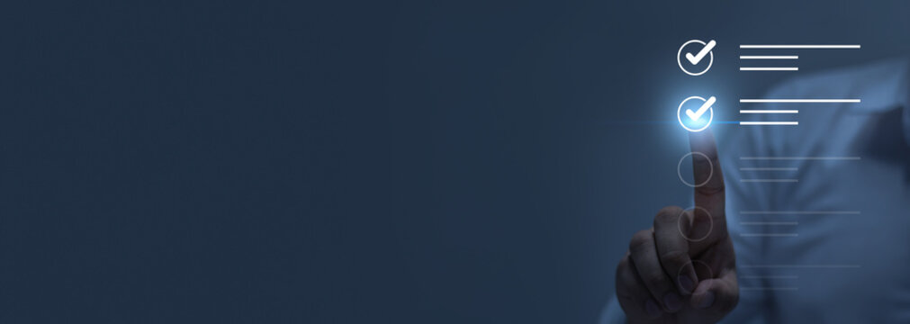 Businesswoman using pen to tick correct sign mark in checkbox for quality document control checklist and business approve project concept.