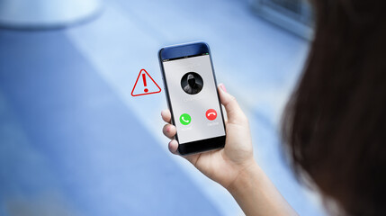 Phone Scam, fraud or phishing concept.Unknown caller show on mobile phone screen.