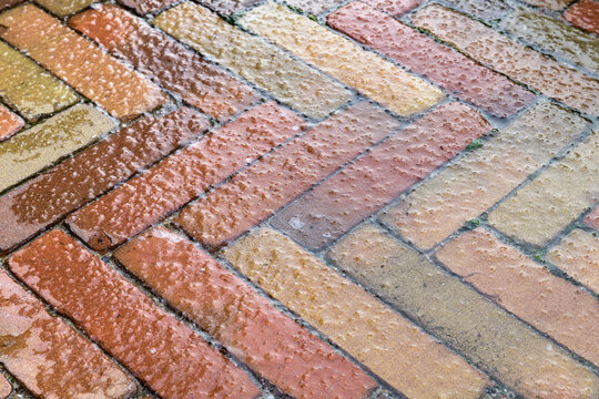 Close up of slippery conditions caused by glaze ice on surface of the street during the winter season.
