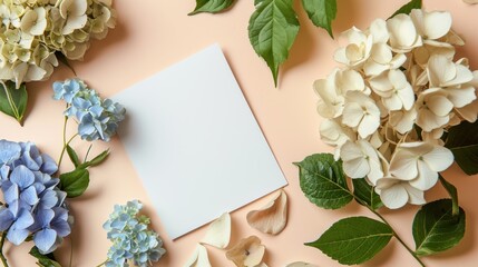  a sheet of paper surrounded by blue and white hydrangeas and green leaves on a pink background with space for text.
