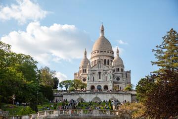 Paris, France - May 20, 2023: view on the exterior of the Basilica of the Sacred Heart of Paris Montmartre - obrazy, fototapety, plakaty