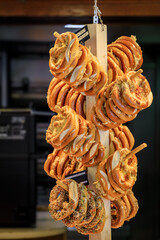 Savory pretzel or bretzel with sea salt for sale at a French bakery in Colmar, France, a village on...