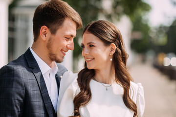 A man and woman smiling. 5112