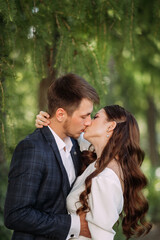 A man and a woman kissing 5141.