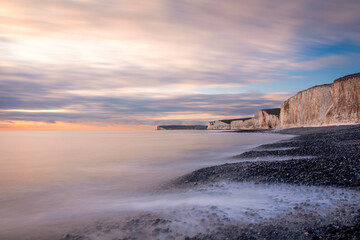 January sunset high tide at Birling gap and the seven sisters cliffs on the east Sussex coast south...