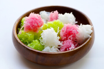 Sweet coconut balls, crispy coconut candies (Maprao Gaew). Thai traditional dessert