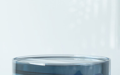 Modern design round blue glass podium table in sunlight, palm tree leaf shadow on wall for luxury beauty, cosmetic, skincare, body care, fashion product display background 3D