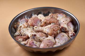 Seasoned raw chicken drumsticks