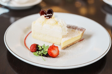 Homemade Cheese Cake with fresh strawberries and Berries. Dessert for Happy Valentine Day celebration