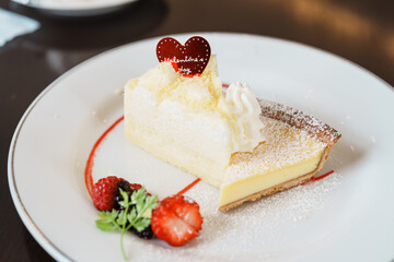 Homemade Cheese Cake with fresh strawberries and Berries. Dessert for Happy Valentine Day celebration