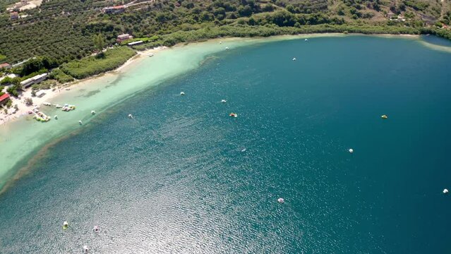 Aerial footage of Lake Kournas (Limni Kourna) near the village of Kournas in Crete island, Greece