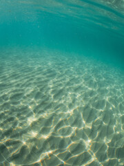 Deep blue ocean sand floor view.