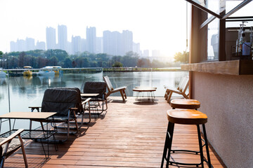Tables and chairs at the lakeside restaurant
