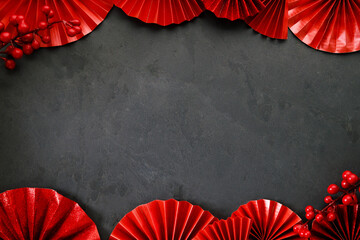 Chinese new year festival decorations with red Chinese folded fans.