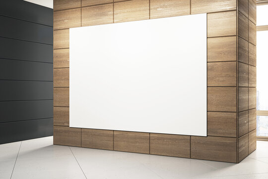 Minimalist gallery space featuring a large white poster on wooden wall, sleek design elements. Exhibition concept. 3D Rendering