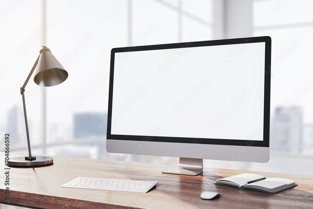 Poster contemporary wooden designer desk with white computer monitor, coffee cup, supplies, other objects a