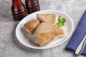 Roasted red tuna steak in the plate