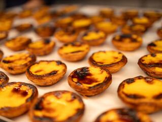 pastel de nates on a plate