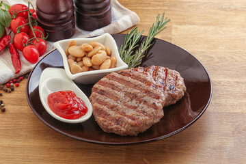 Grilled beef burger cutlet with sauce