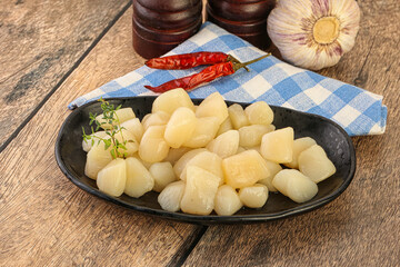 Raw scallop seafood in the bowl
