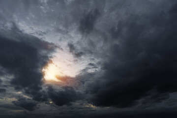 Fototapeta na wymiar Rain cloud heavy sky, windstorm dark black.