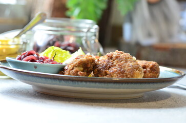 a traditional Czech dish of fried meatballs, minced meat with vegetables,