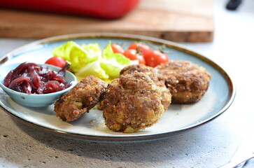a traditional Czech dish of fried meatballs, minced meat with vegetables,