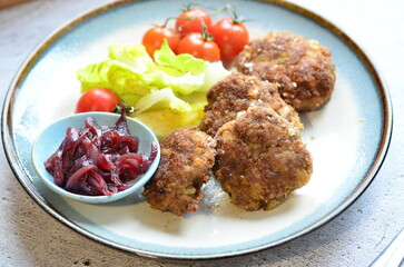 a traditional Czech dish of fried meatballs, minced meat with vegetables,