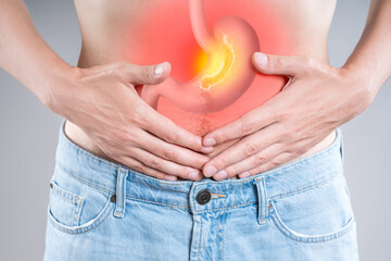 Stomach ulcer, man with abdominal pain suffers from abdomen disease, symptoms of gastritis, diseases of the digestive system - obrazy, fototapety, plakaty