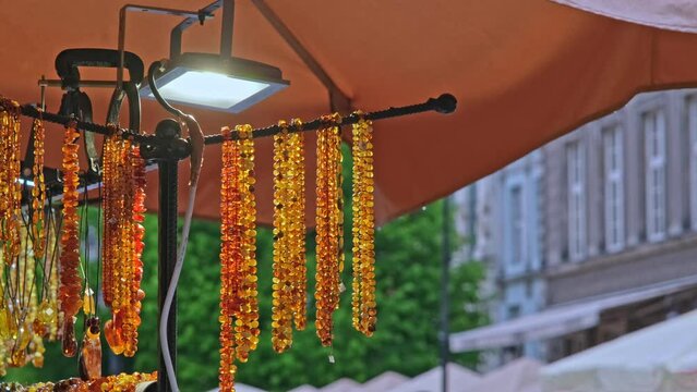 Expensive Amber Bead Necklace Sold on Outdoor Jewelery Market Stand