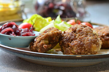 a traditional Czech dish of fried meatballs, minced meat with vegetables,