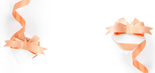 White gift boxes with pink ribbon bow, copy space. Happy Women's, Mother's, Valentine's Day, Birthday greeting card.