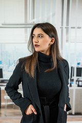 Portrait of alone caucasian business woman manager in office hall