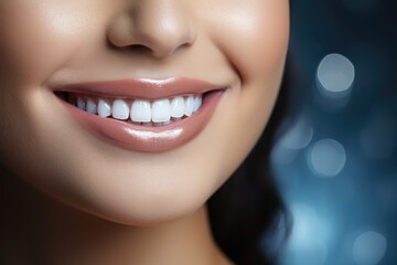 close-up of a female snow-white Hollywood smile on a blue background