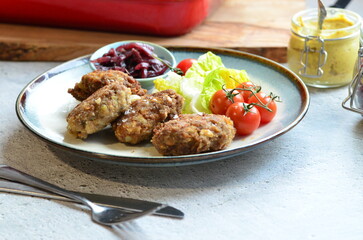 a traditional Czech dish of fried meatballs, minced meat with vegetables,