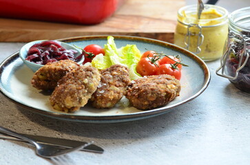 a traditional Czech dish of fried meatballs, minced meat with vegetables,