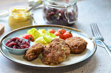 a traditional Czech dish of fried meatballs, minced meat with vegetables,