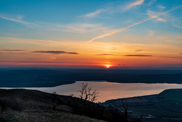 Fototapeta na wymiar Sunrise above Nove Mlyny dam from Devin hill in Palava mountains in Czech republic
