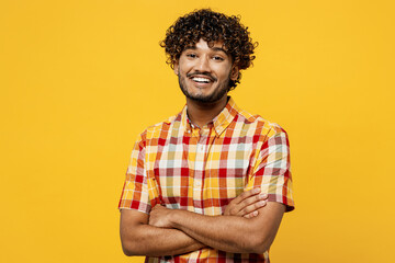 Young smiling happy cheerful Indian man he wearing shirt casual clothes look camera hold hands...