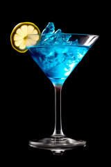 Blue Curacao cocktail garnished with a lime isolated on black background