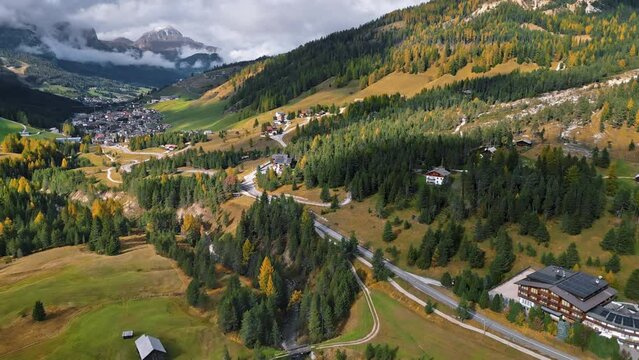 Aerial drone view of Santa Lucia town in Val Gardena in Dolomites, Italy