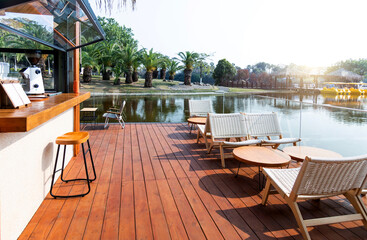 Tables and chairs at the lakeside cafe