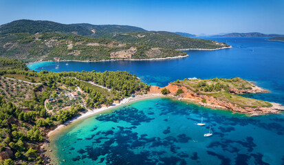 Aerial view of the impressive Kokkinokastro Beach at Alonissos island, Sporades, Greece, with red...