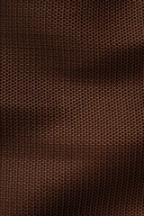 Vertical of a brown woven wavy fabric background